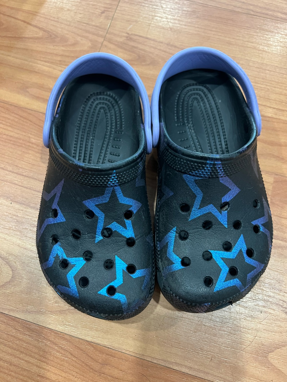 CROCS Kids Black Clogs with Blue and Purple Star Design